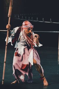 Young woman walking outdoors