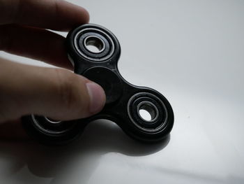 Close-up of hand holding eyeglasses