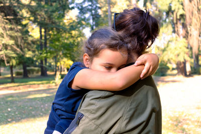 Portrait of mother and daughter woman