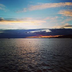 Scenic view of sea at sunset