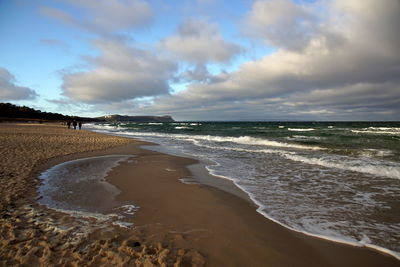 Scenic view of beach against sky