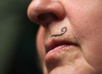 Close-up of woman with face paint