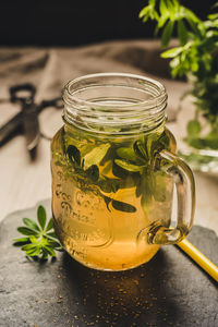 Close-up of tea in jar on table