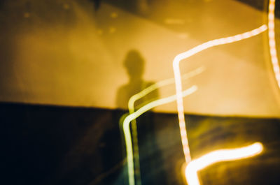 Close-up of illuminated lighting equipment at night