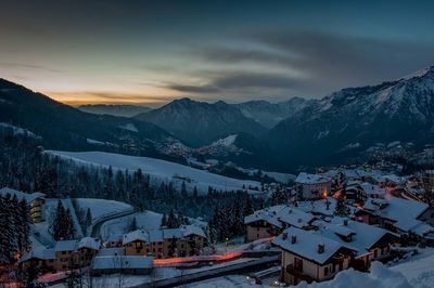 Scenic view of snowcapped mountains against sky during winter