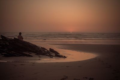 Scenic view of sea against clear sky during sunset