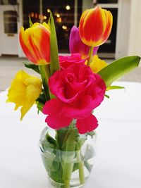 Close-up of rose flower vase on table