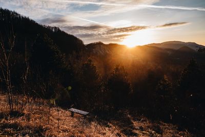 Scenic view of landscape against sky during sunset