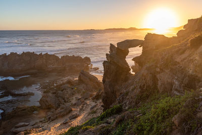 Scenic view of sea against sky during sunset