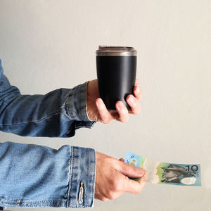 Man holding coffee cup