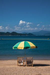 Vintage chairs on the beach in cheung chau hong kong 