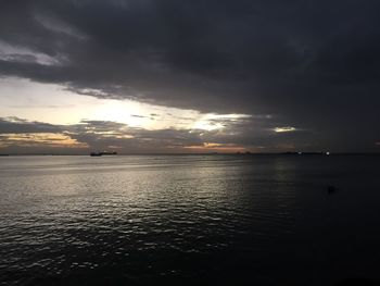 Scenic view of sea against sky at sunset