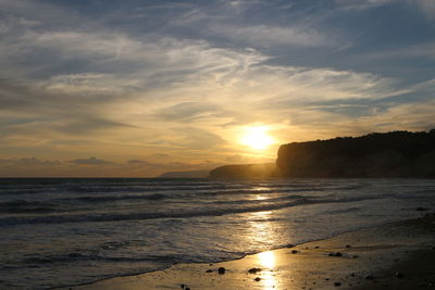 Scenic view of sea against sky during sunset