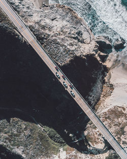 High angle view of railroad tracks by water