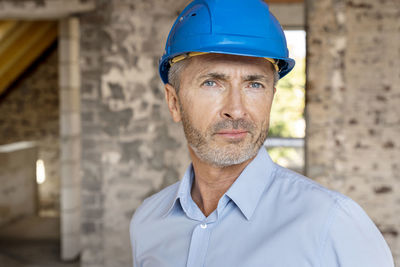 Portrait of man wearing hat