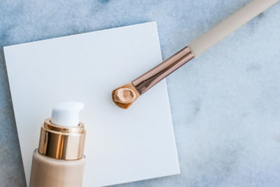 Close-up of beauty products on table