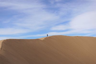 Scenic view of desert against sky