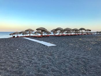 Scenic view of beach against clear sky