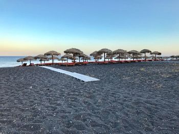 Scenic view of beach against clear sky