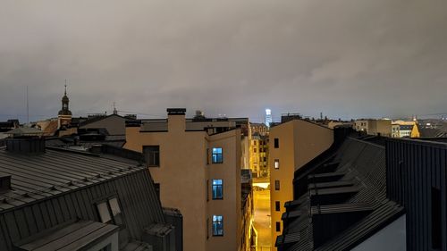 Buildings in city against sky