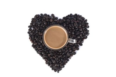 High angle view of coffee cup against white background