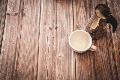 High angle view of coffee cup on table