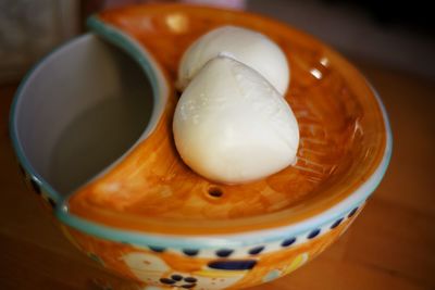 High angle view of eggs in container on table