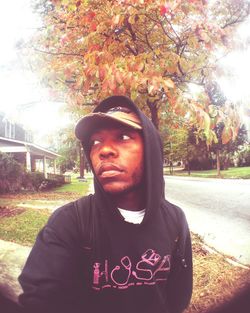 Close-up of young man in park