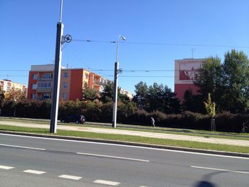 Road with buildings in background