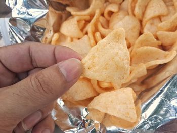 Close-up of hand holding food