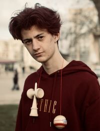 Portrait of young man standing outdoors