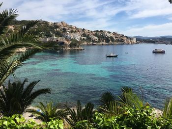 Scenic view of bay against sky