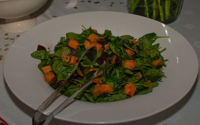 High angle view of chopped vegetables in plate