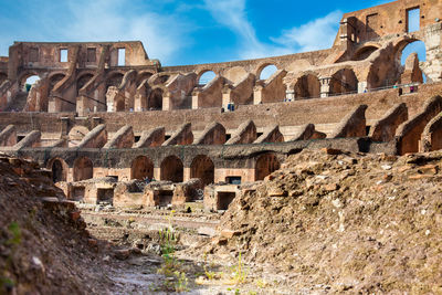 View of the seating areas and the hypogeum of the ancient colosseum in rome