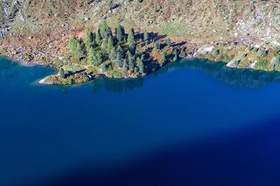 High angle view of lake by mountain