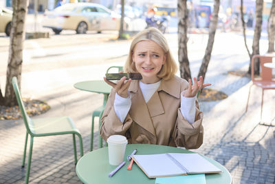 Young woman using mobile phone