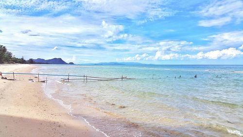 Scenic view of sea against cloudy sky