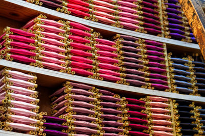 Full frame shot of multi colored chairs in shelf