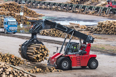 Logging vehicle carrying timber