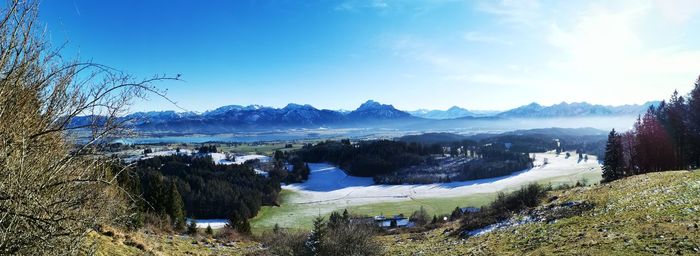 Panoramic view of landscape and lake against sky