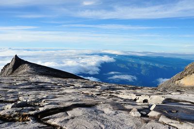Mount kinabalu against clouds
