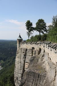 View of castle on mountain against sky