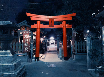 Illuminated entrance of building at night