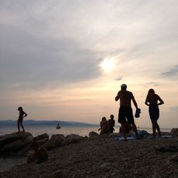 Scenic view of beach at sunset