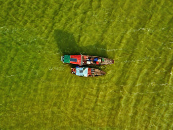 High angle view of toy floating on lake
