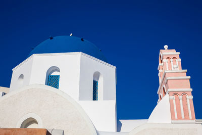 Traditional architecture of the churches of the oia city in santorini island