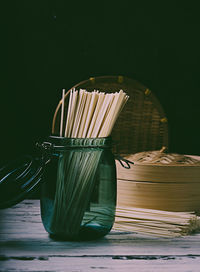 Close-up of chairs on table