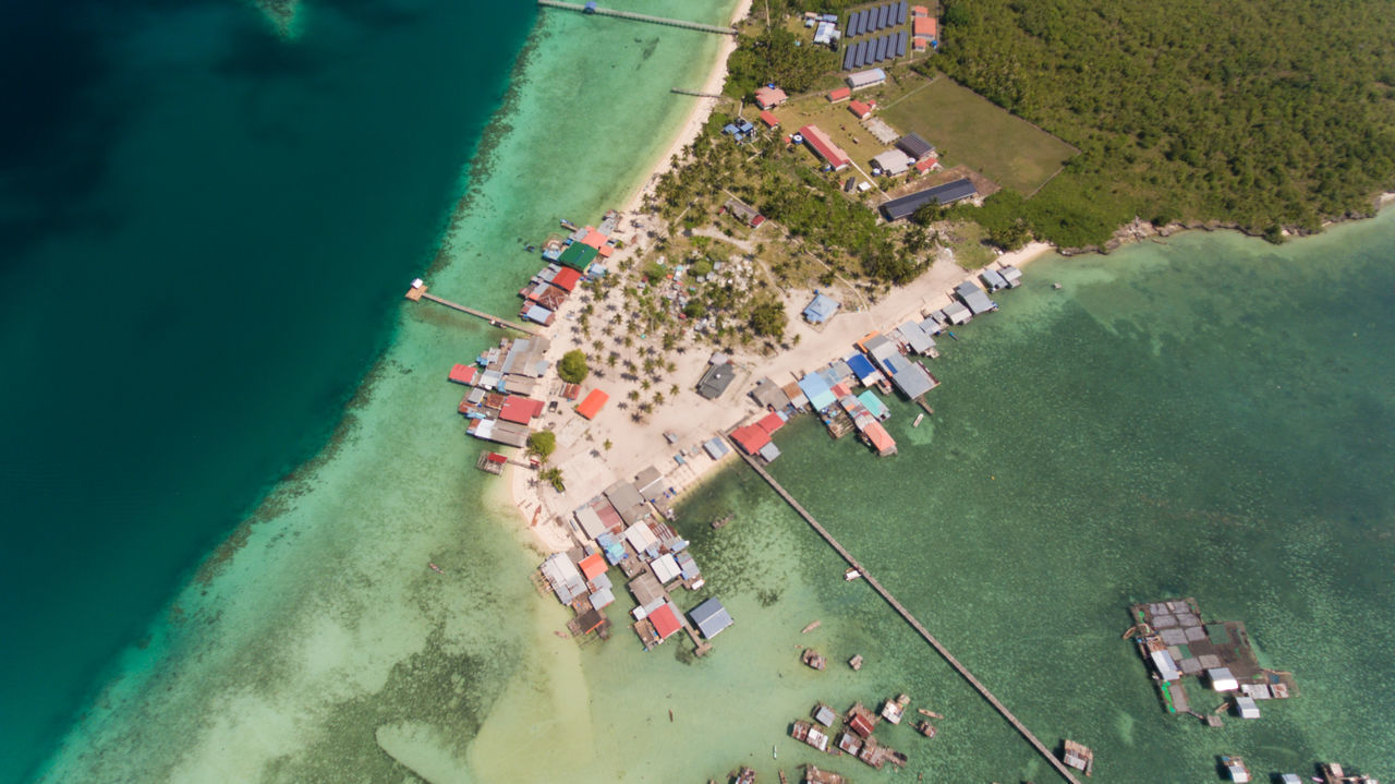 water, high angle view, nature, day, sea, architecture, plant, transportation, built structure, outdoors, tree, group of people, aerial view, nautical vessel, beach, crowd, beauty in nature, people, scenics - nature