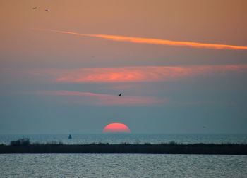 Scenic view of sunset over sea