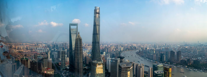 High angle view of modern buildings against sky